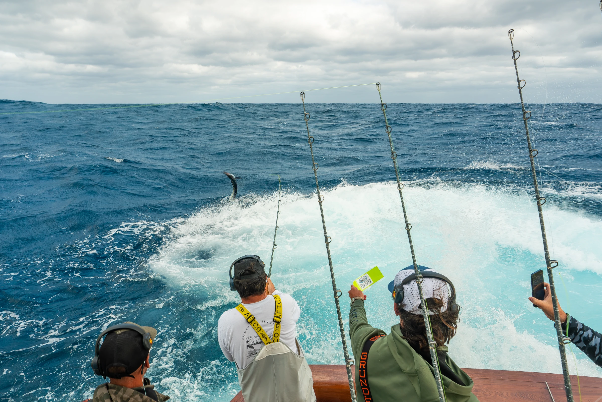 Sailfish jumping with anglers watching